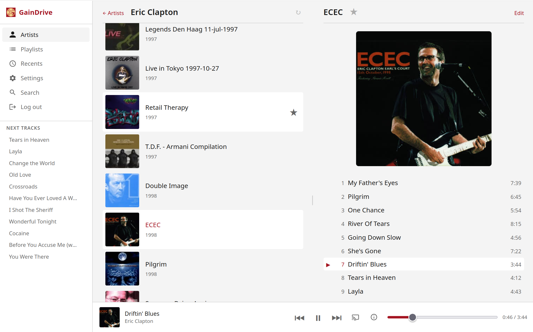 The GainDrive built-in web player showing an album with track list, queue and now-playing bar